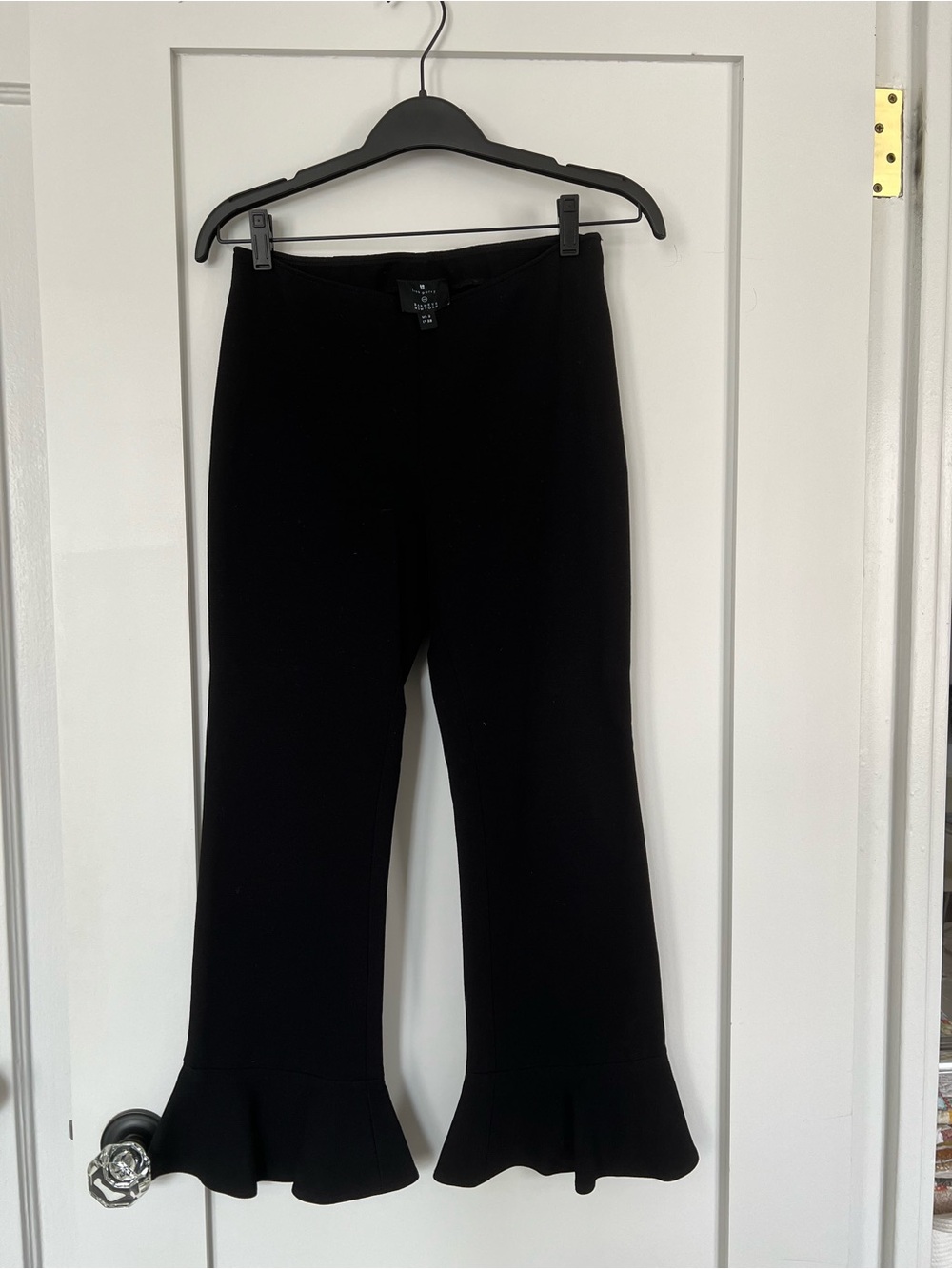 Lisa Perry Barneys New York black ankle pants with ruffled hem. Size 2.